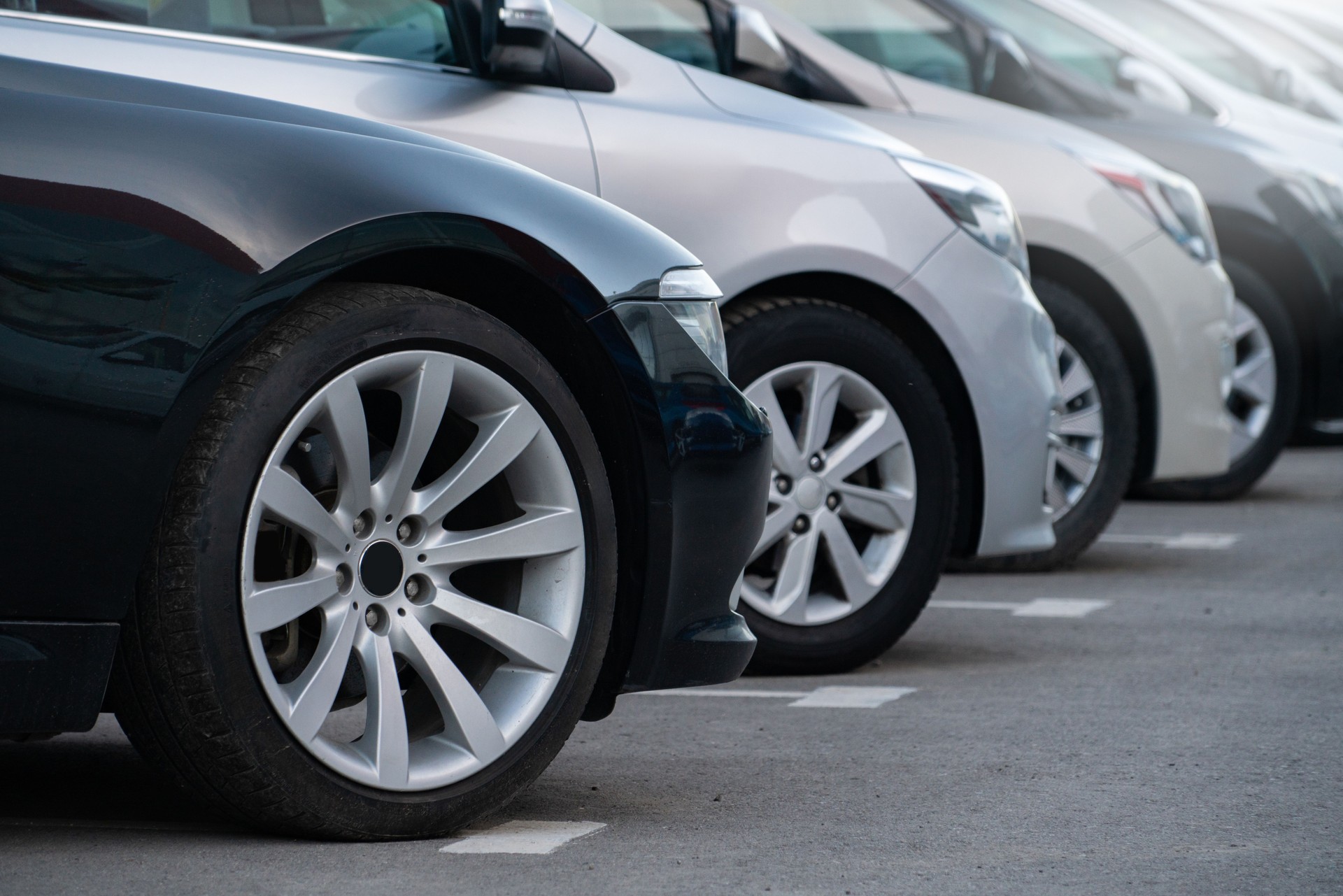 A lot of cars in a rows. Used car sales